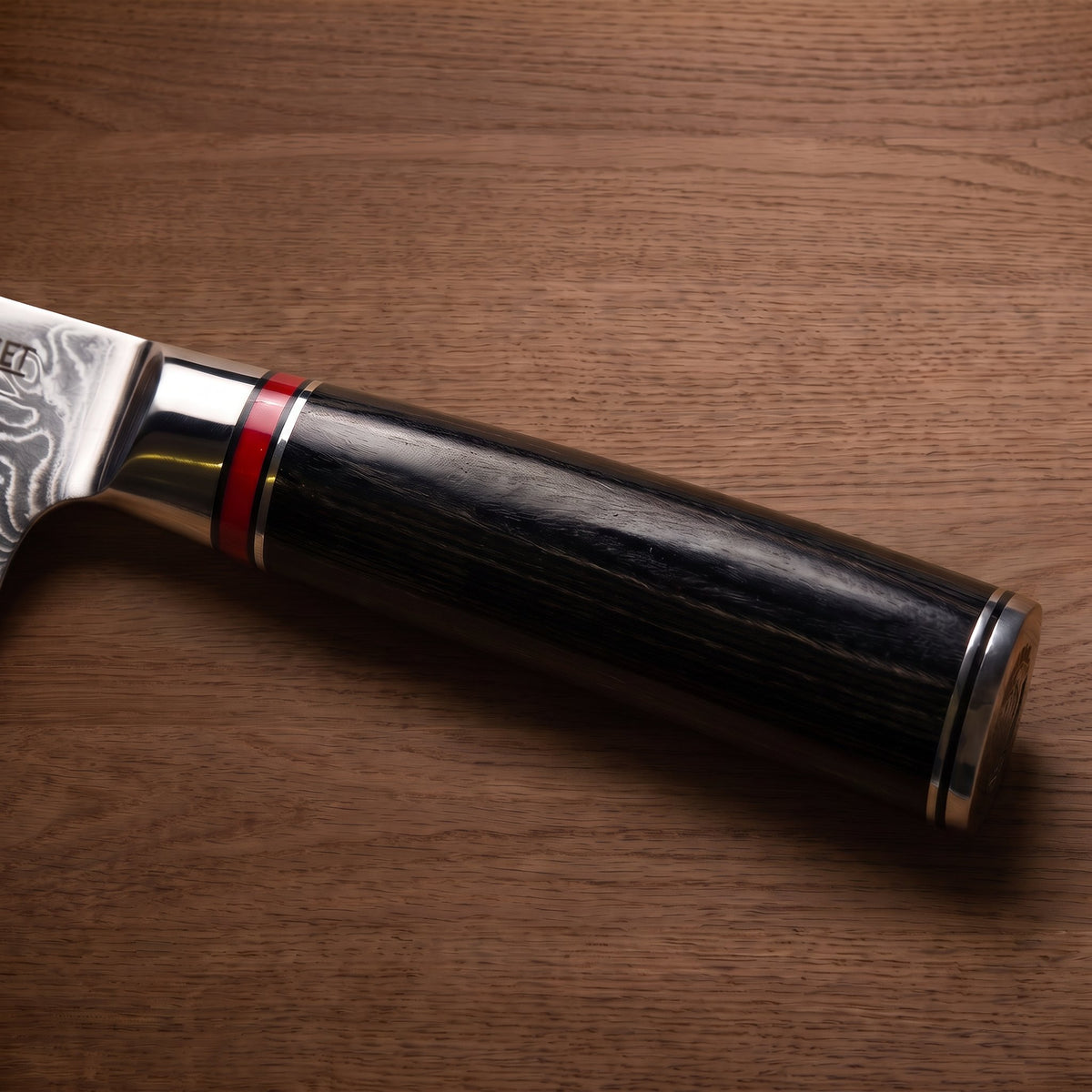 Manche en bois de pakka noir avec l’anneau rouge signature Rouge Mermet